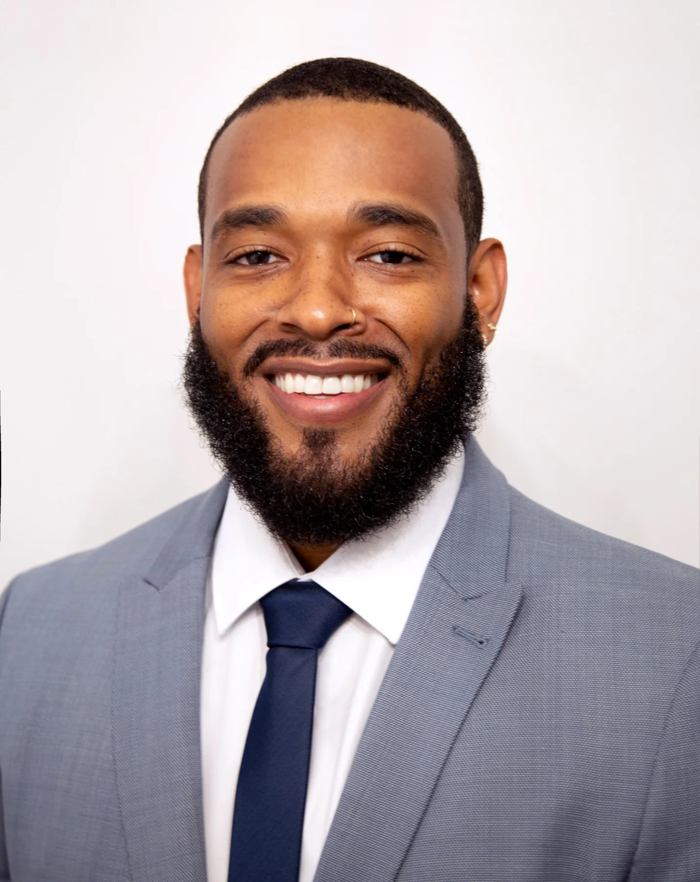 Professional portrait of Xavier Raymore